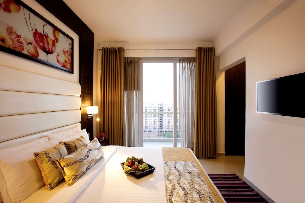 GOLDEN TULIP BHIWADI 7/33