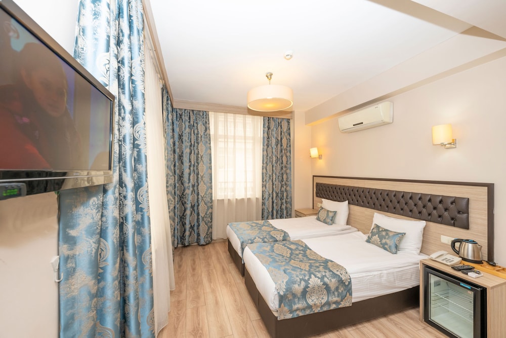 TUGRA HOTEL 26/65