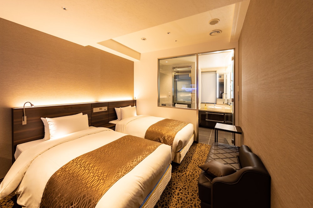 BASIC, TWIN BEDS, NO CLEANING SERVICES