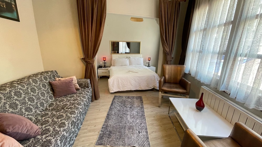 غرفة عائلية رباعية بسرير كوين وأسرّة بطابقين مع أريكة، Chez Bore Boutique Hotel 4/10