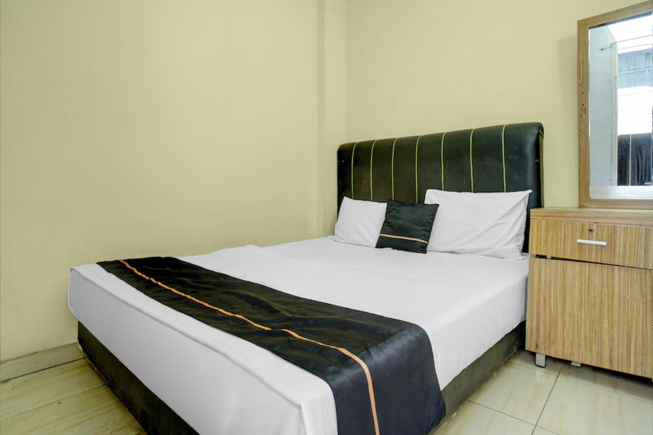 Room at Hotel O near Stadion Pahoman formerly Rama Shinta Guest House, BANDAR LAMPUNG