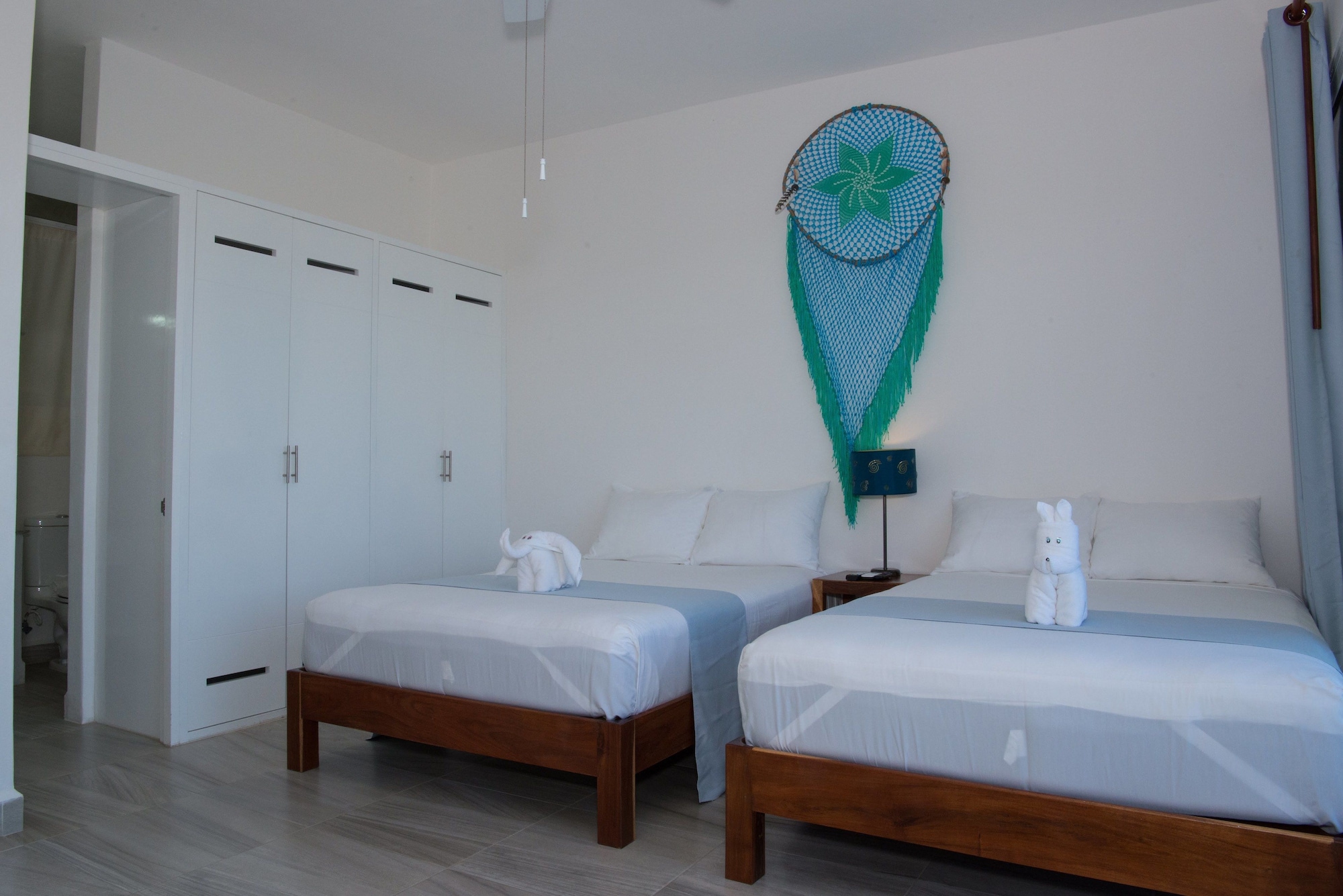 جناح فاخر اقتصادي تنفيذي بسريرين مزدوجين مع أريكة، Ocean Zen Suites 4/8