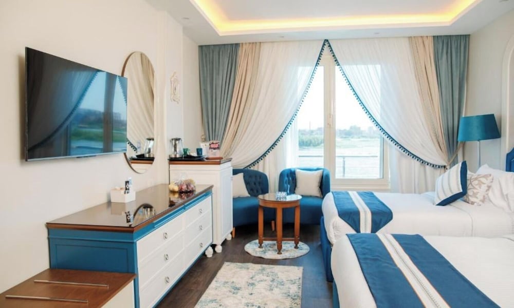 غرفة سوبيريور بسريرين منفصلين بإطلالة على النهر بغرفة نوم واحدة، Trans Nile Hotel 2/8