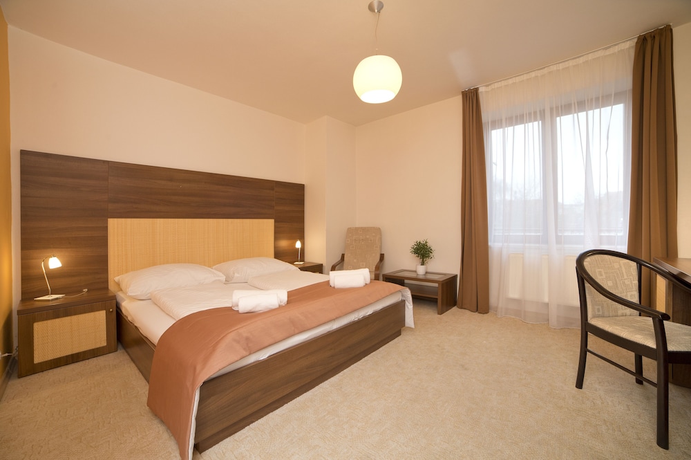 Superior, Triple, 1 Single and 2 Double Beds