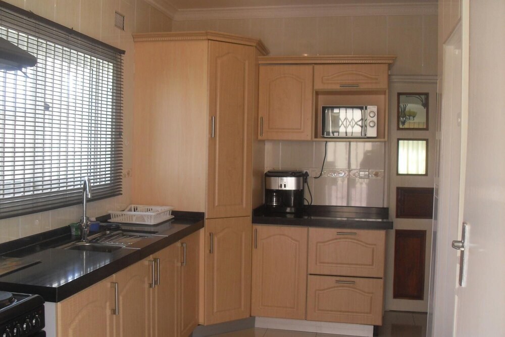 Home Up Guest House 22/25