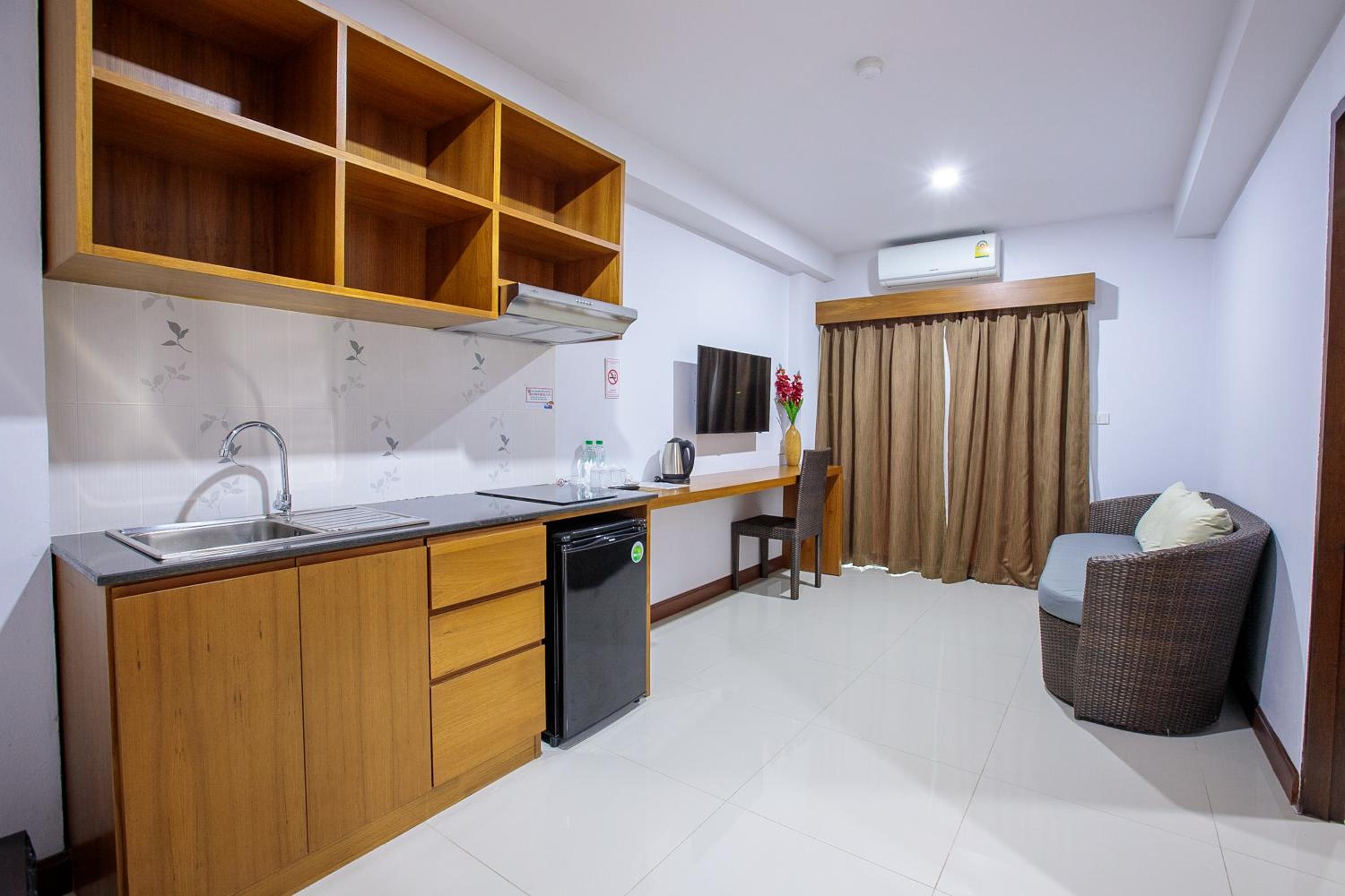 جناح جونيور بسرير كينج، Huen Jao Ban Hotel 5/7