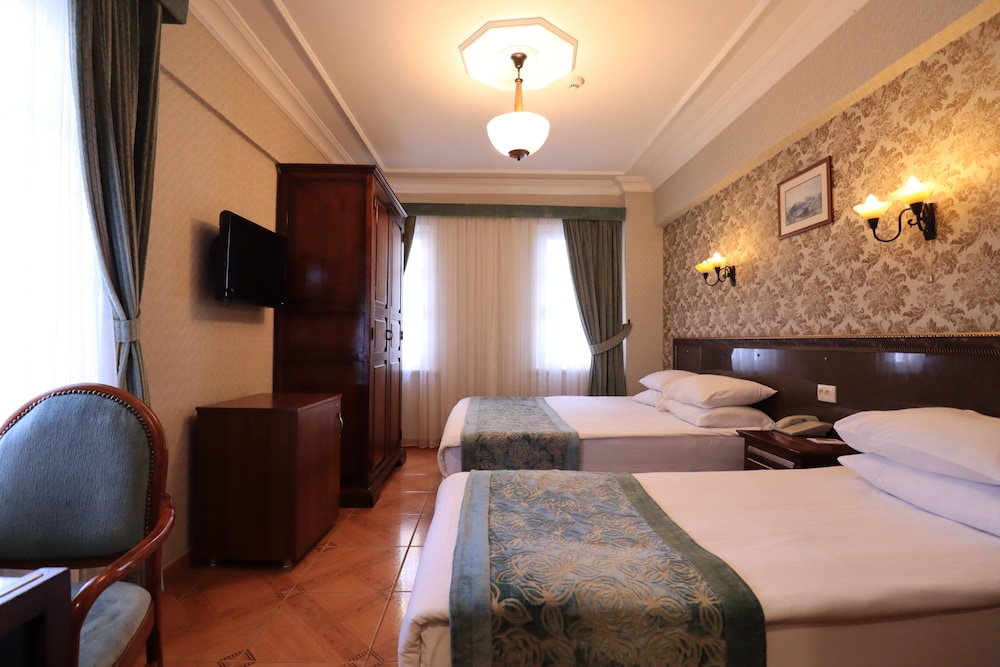 غرفة قياسية ثلاثية بسرير مزدوج وسرير فردي، Blue House Hotel 3/5