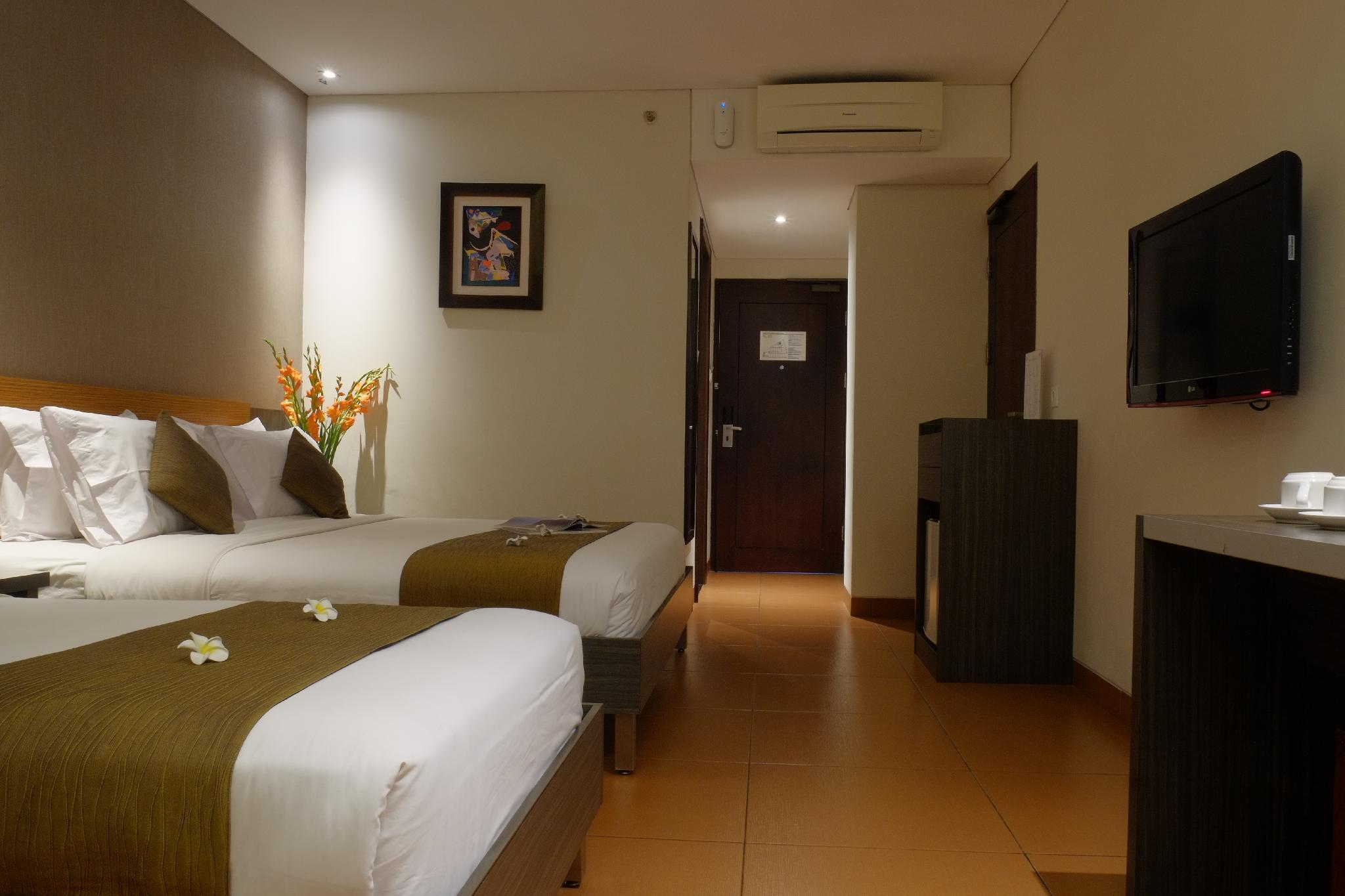 غرفة بريميير ثلاثية بسرير مزدوج وسرير فردي، Sukajadi Hotel, Convention and Gallery 2/2