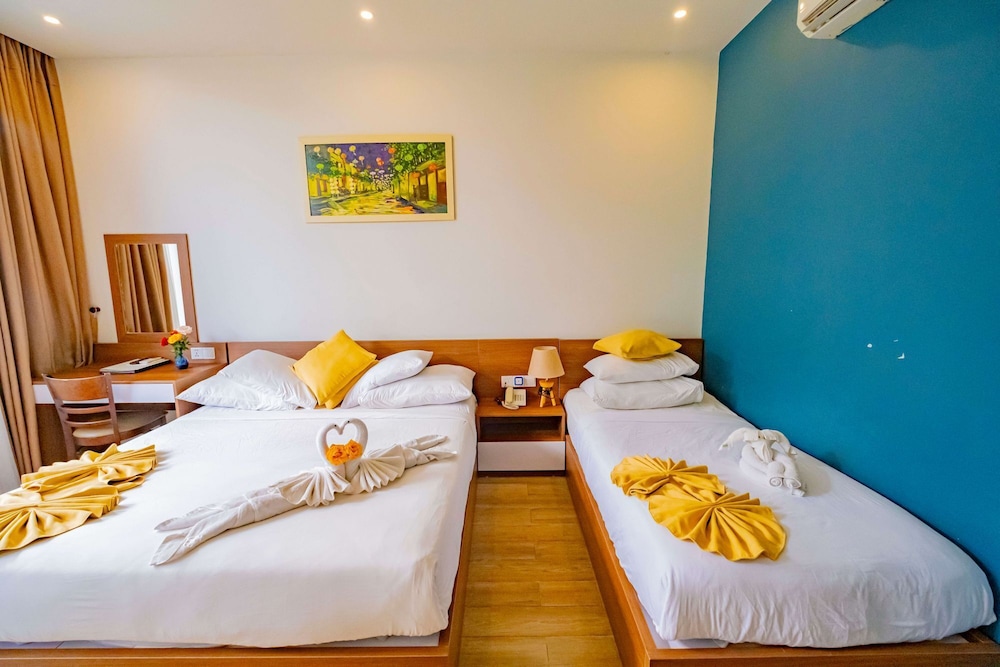 غرفة ديلوكس ثلاثية بسرير كوين وسرير فردي بغرفة نوم واحدة، Hoi An Majestic Villa 5/10