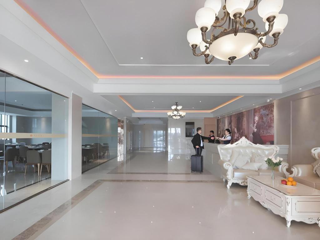 Vienna Hotel (Tongxiang Puyuan) 8/54