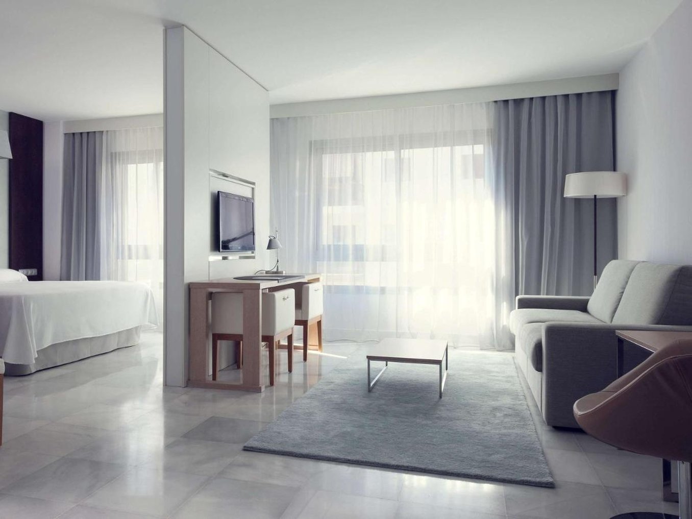 Suittes Hotel 25/36