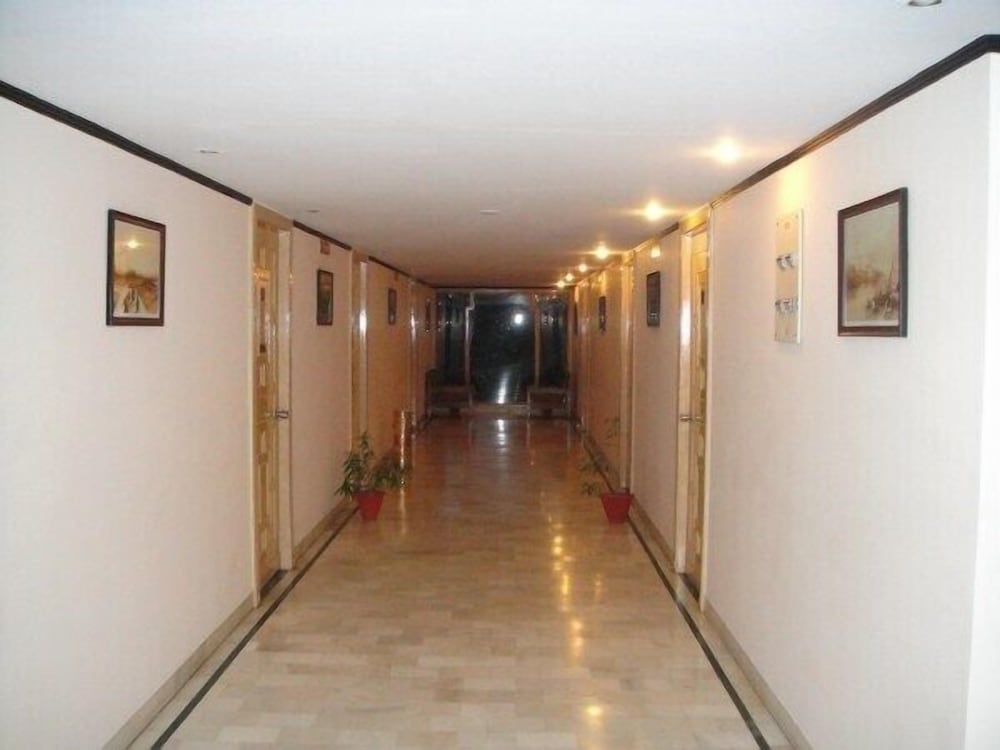 THE RADHA ASHOK 32/50