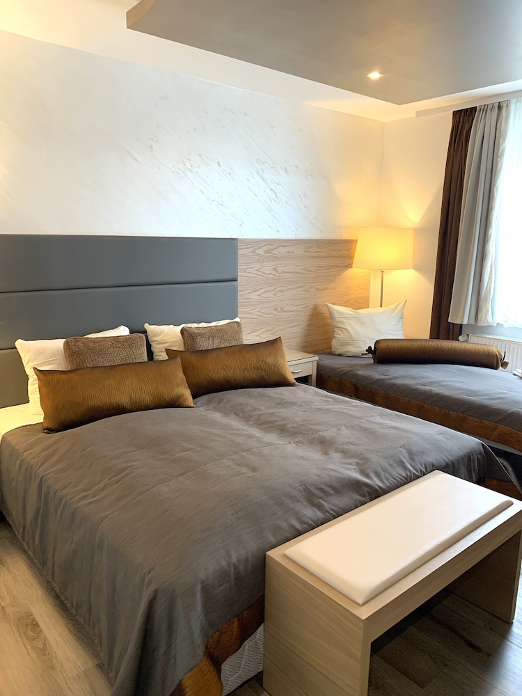 غرفة عائلية بسرير كينج وسرير فردي، Boutique Hotel Goldene Henne 4/7