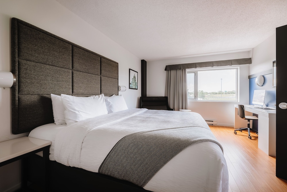 جناح ديلوكس بسرير كينج، Hotel Le Dauphin Montreal Longueuil 2/5
