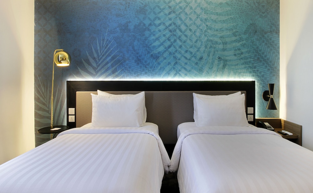 غرفة ديلوكس بسريرين منفصلين، Swiss-Belinn Airport Surabaya 4/4