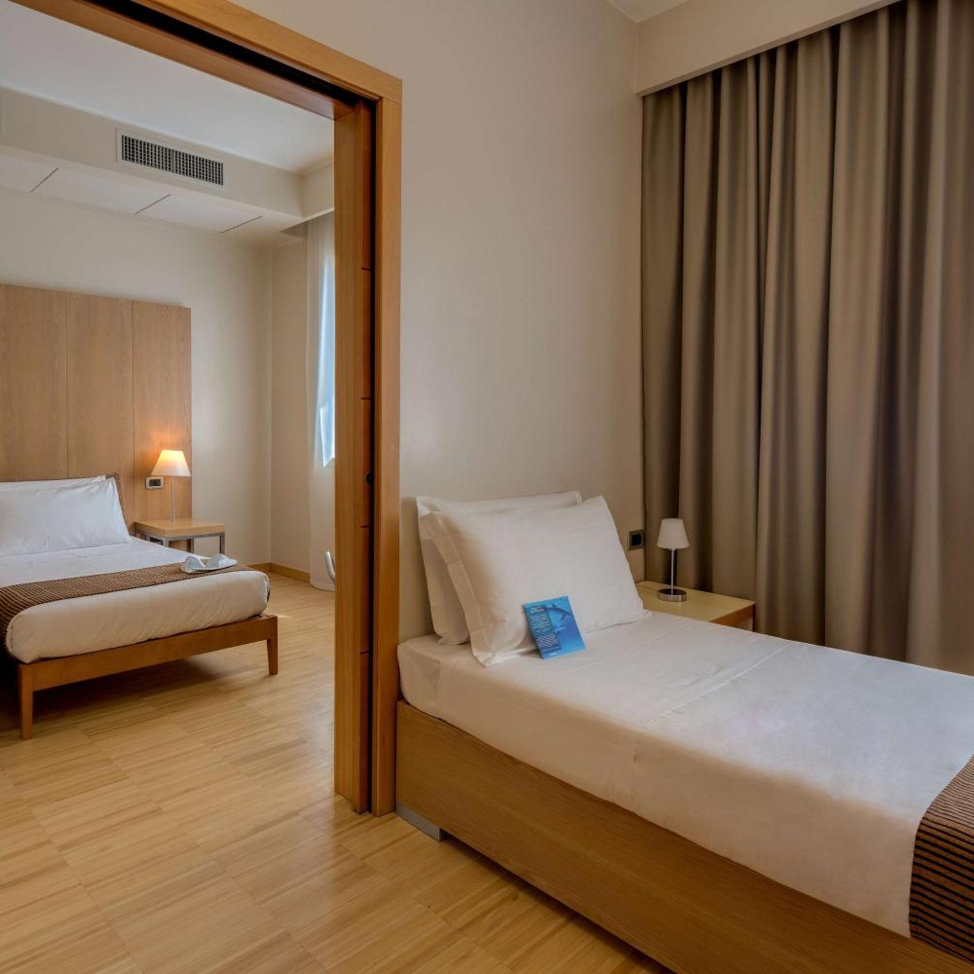 غرفة كلاسيكية بسرير فردي وسرير كوين، Best Western Plus Hotel Bologna 4/11