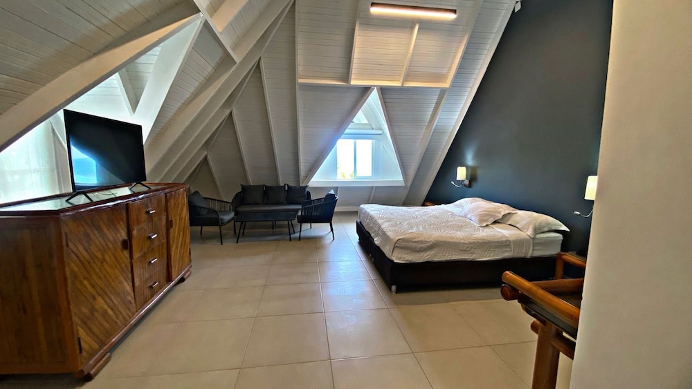 Deluxe, Multiple Beds, Partial Sea View