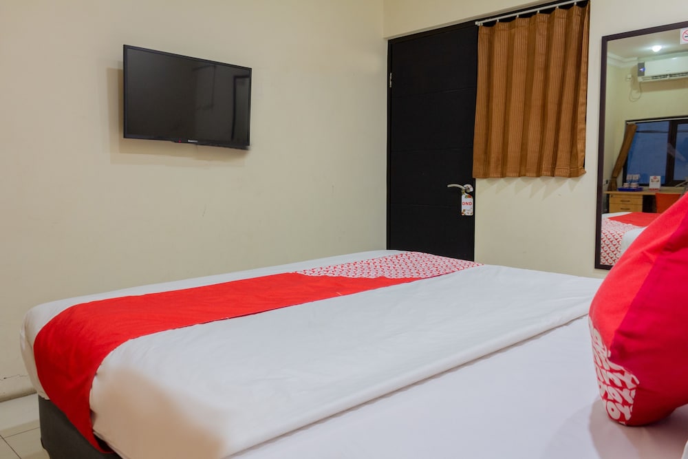 Oyo 989 Audah Guesthouse Syariah 9/36