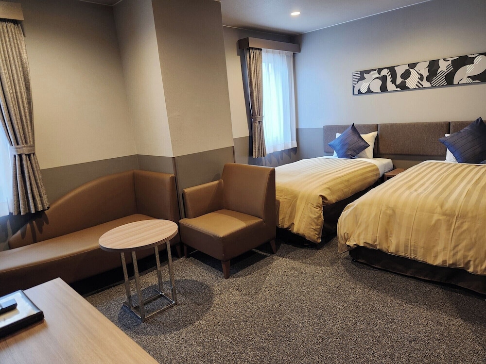 DELUXE, TWIN BEDS, SMOKING