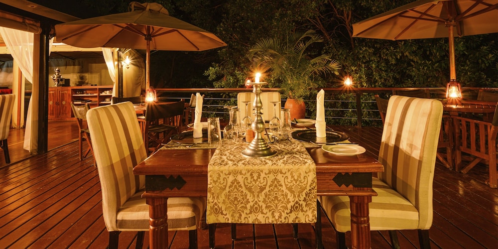 OLARE MARA KEMPINSKI MASAI MARA 38/50