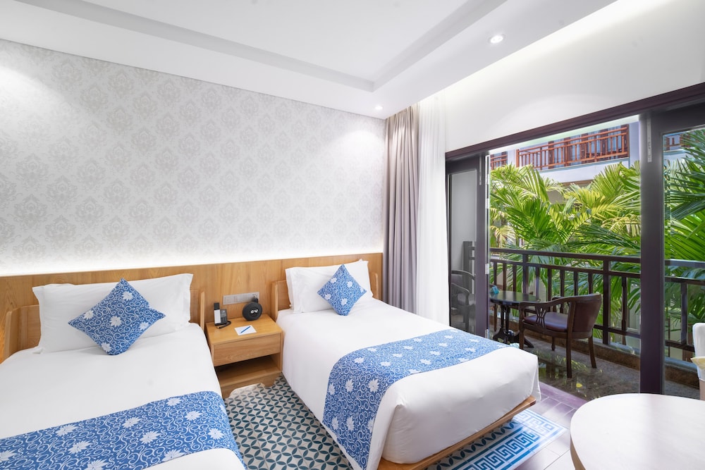 Faifo Twin with Garden View، Wafaifo Resort Hoi An 3/6