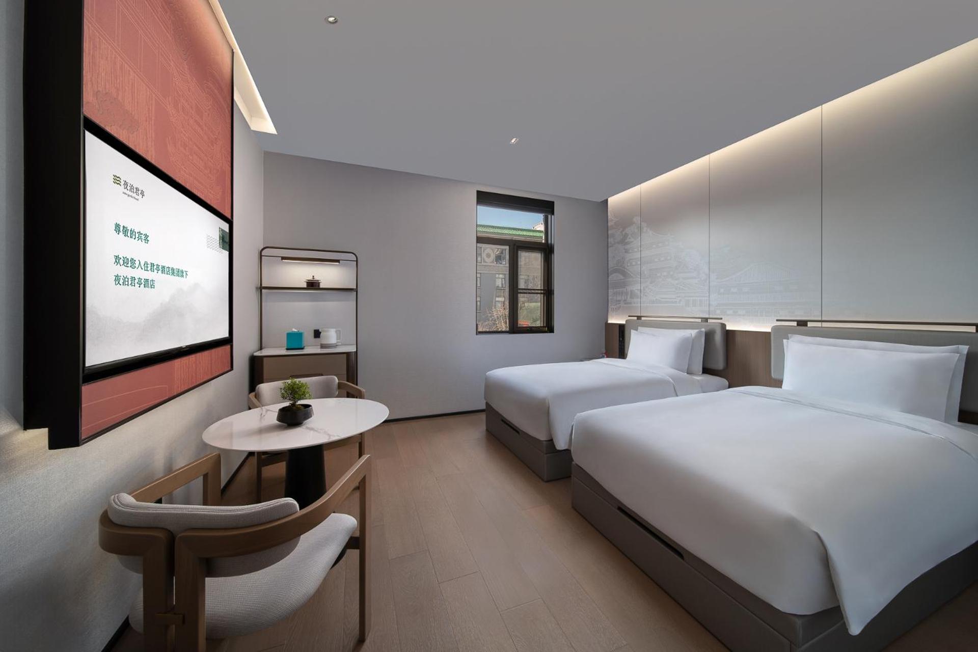 غرفة بسريرين منفصلين بإطلالة على الحديقة، SSAW Garden Hotel Beijing 3/6