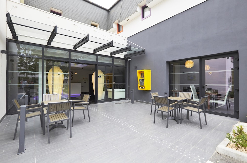 Hotel Kyriad Saint Quentin En Yvelines - Montigny 34/58