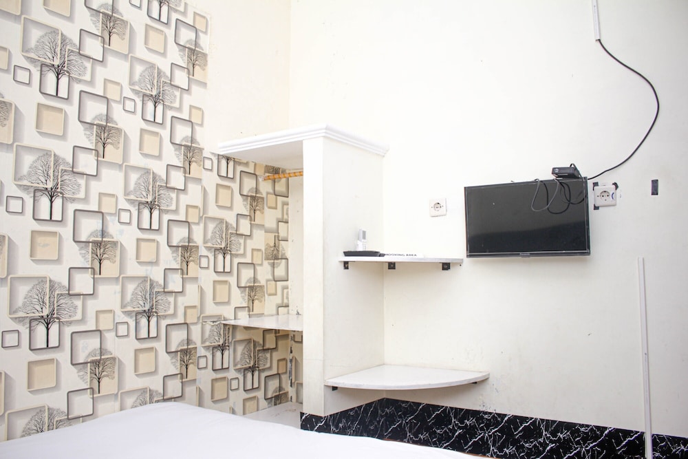 Super OYO Capital O 2258 Santana Syariah Guest House 35/41