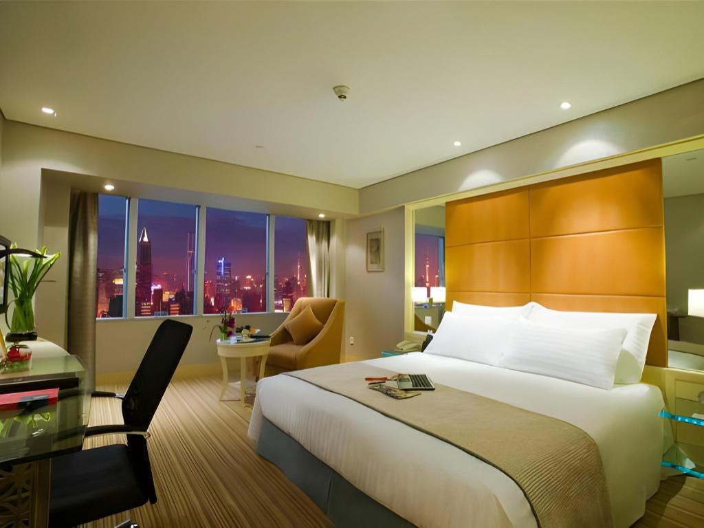 غرفة ديلوكس بسرير كوين، Jin Jiang Tower Hotel 2/7
