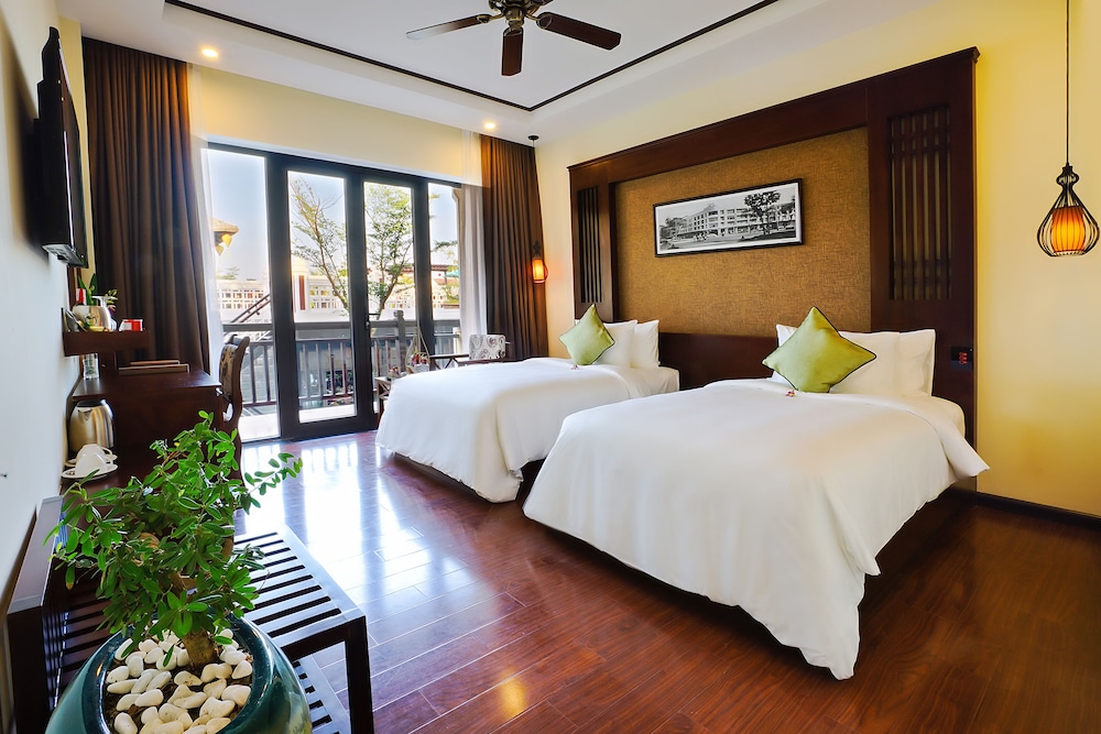 غرفة سوبيريور مزدوجة بسريرين منفصلين بإطلالة على الحديقة، Koi Resort Spa Hoi An 8/10