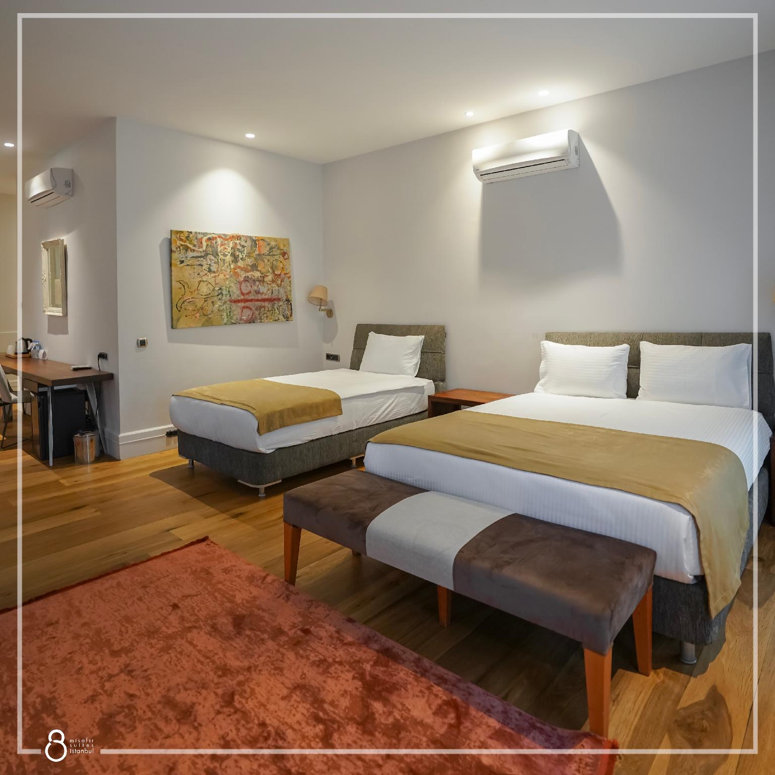 Suite, Triple, 1 King and 1 Single Beds