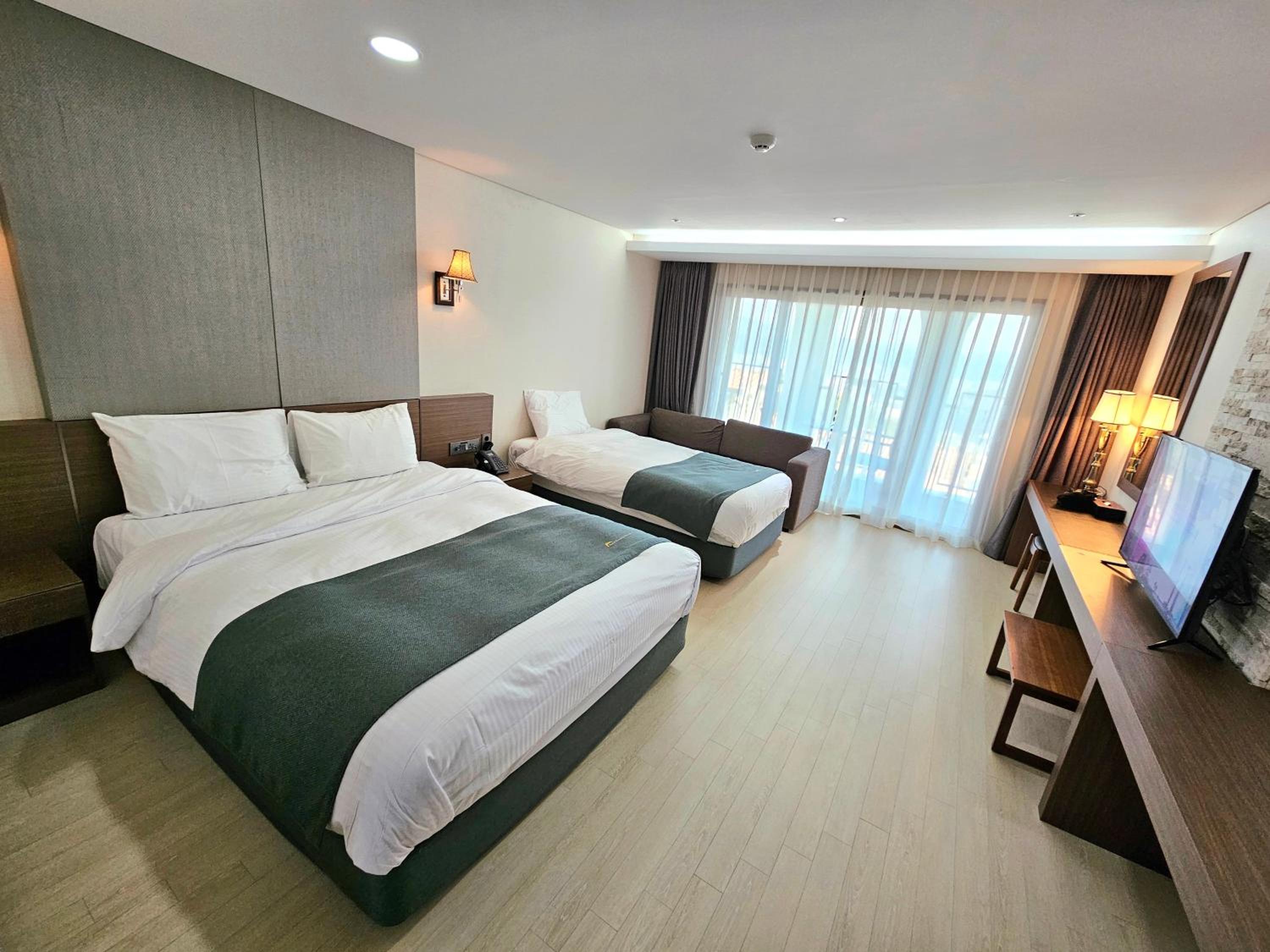 Deluxe, 1 Double and 1 Single Bed, Pool Access
