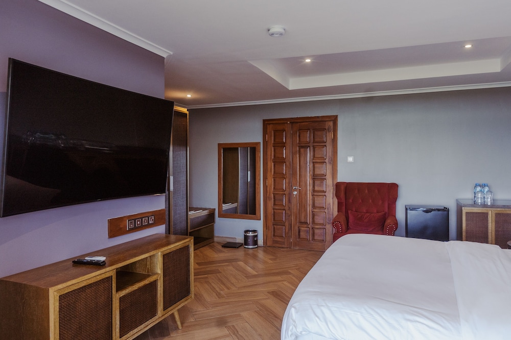 جناح جونيور بسرير مزدوج وسرير فردي، Tanga Beach Resort & Spa 4/10