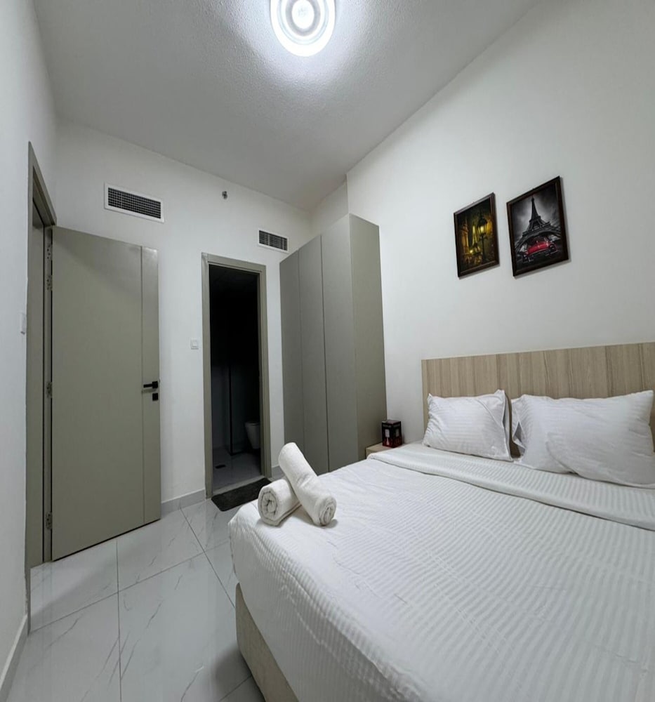 Room at Luxury Apartment with Pool Gym & Free Parking at Equiti Gates Jebel Ali, DUBAI