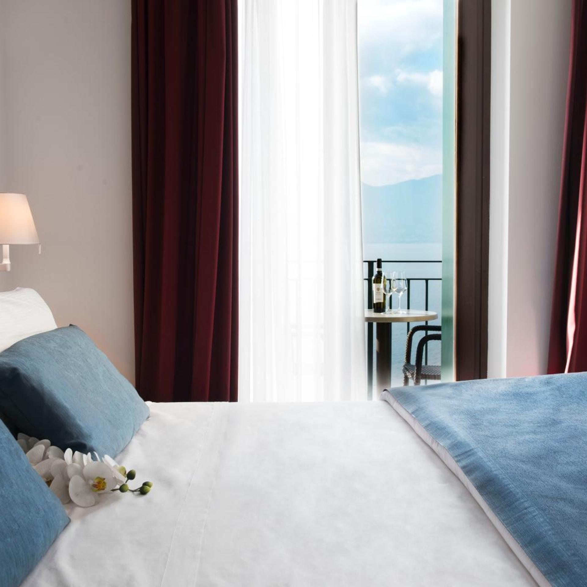 غرفة ديلوكس بسرير مزدوج بإطلالة على البحيرة، Hotel del Porto 7/7