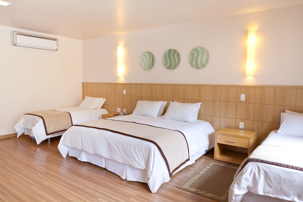 Superior, Deluxe, 1 Double and 3 Single Beds