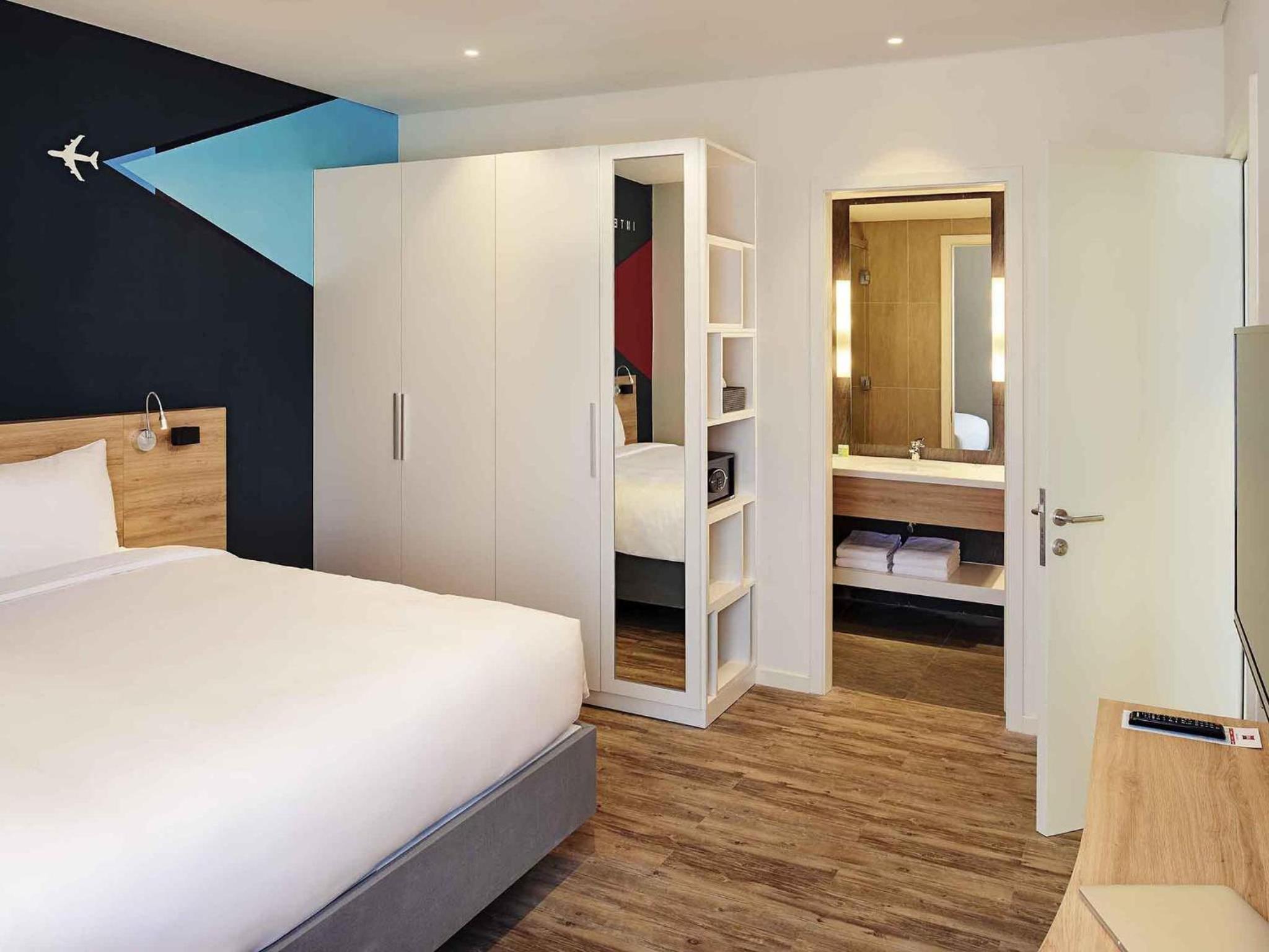 شقة بسرير كينج بغرفتي نوم، Ibis Saigon Airport 3/9