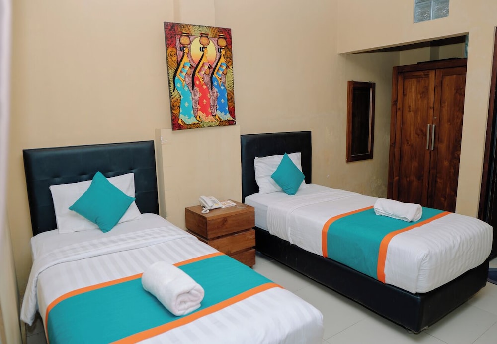 DELUXE, TWIN BEDS