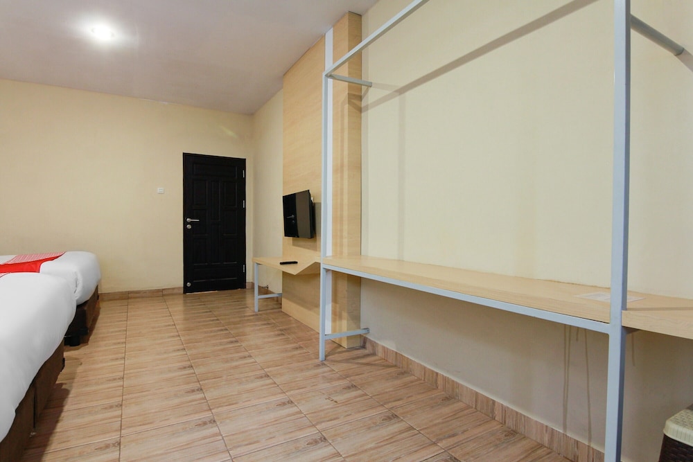 Capital O 3476 Millenium Inn 32/41