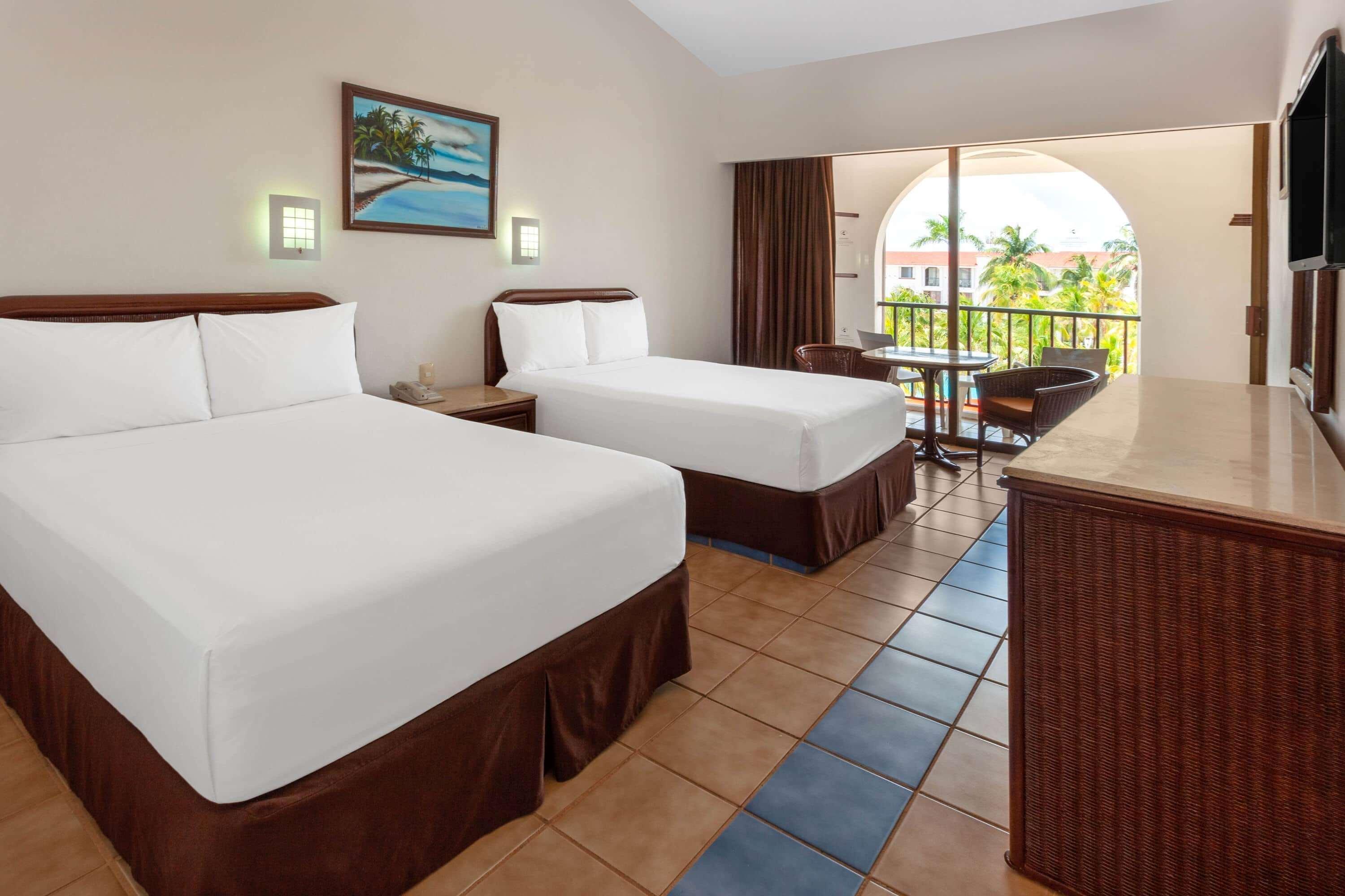 2 Bedrooms, Suite, 1 King and 2 Double Beds