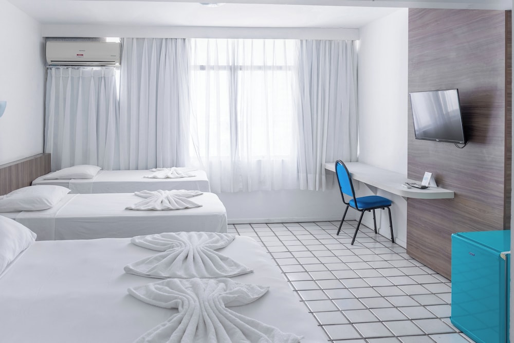 غرفة قياسية رباعية بسرير مزدوج وسريرين منفصلين، Praia Hotel Enseada 5/9