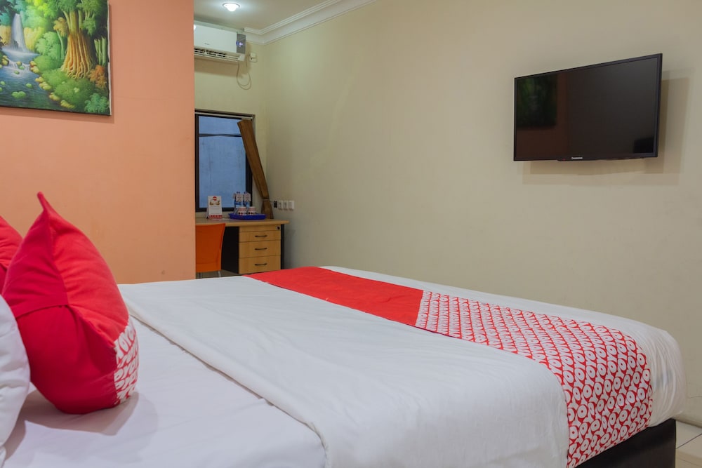Oyo 989 Audah Guesthouse Syariah 8/36