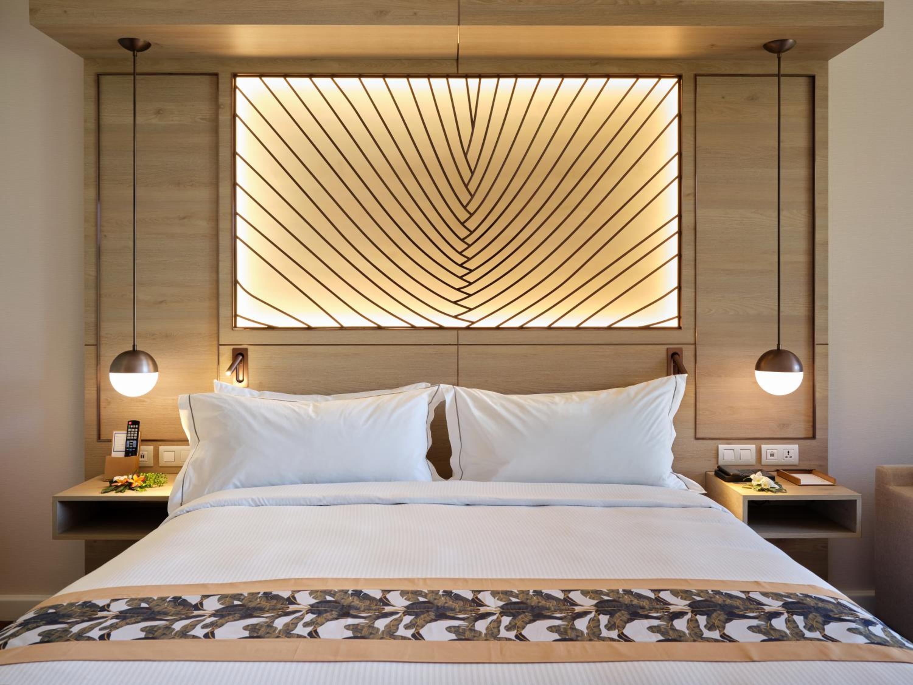 غرفة بسرير كينج بإطلالة على الحديقة مع أريكة، Hilton Hotel Tahiti 4/9