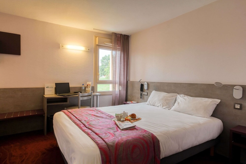 Brit Hotel Le Mans Nord Les Evens 12/36
