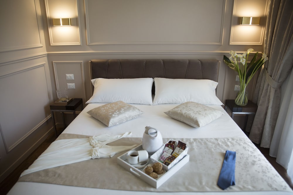 Unicum Roma Suites 8/50
