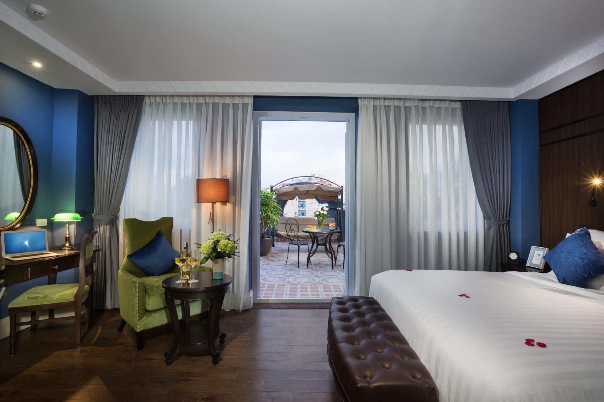 غرفة متصلة ديلوكس بسريرين منفصلين وسرير كينج