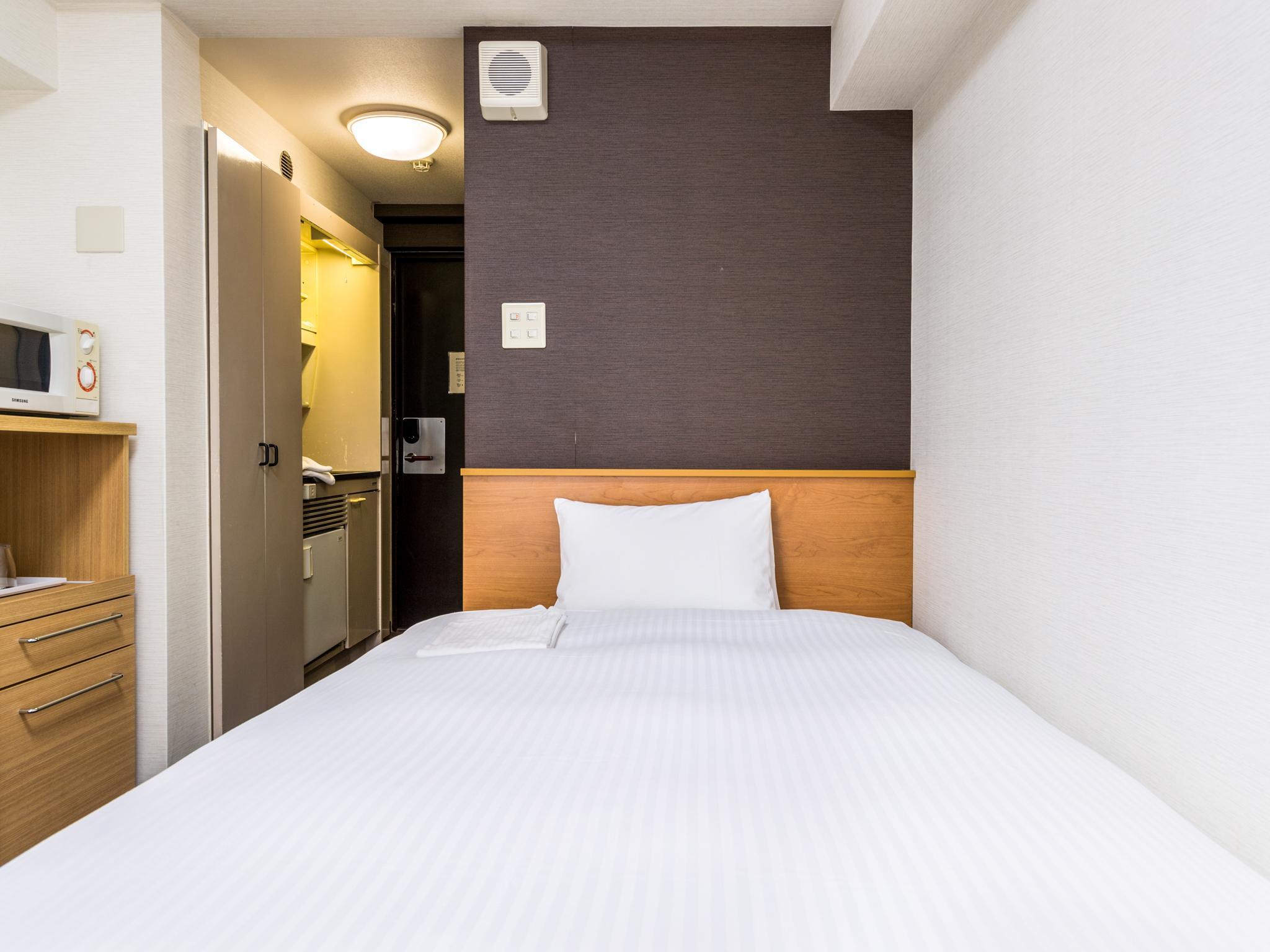 SEMI ROOM, ECONOMY, SEMI DOUBLE BED, NO CLEANING SERVICES