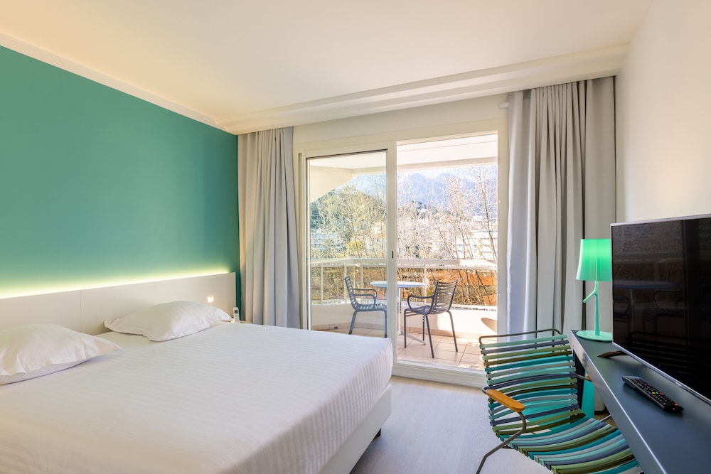 غرفة بسريرين منفصلين بإطلالة على الجبل بشرفة، Hotel Riva Art & Spa 3/7