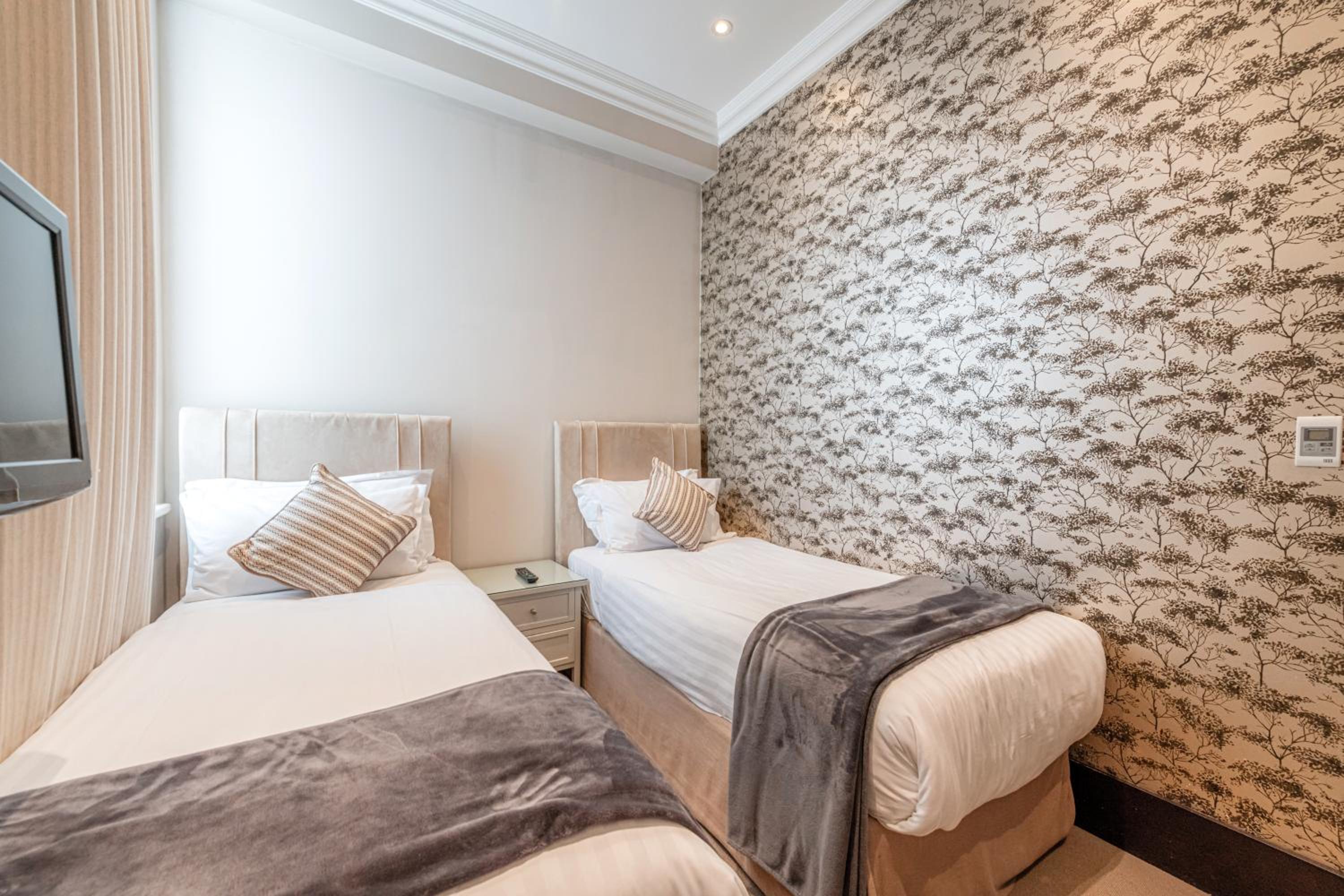 شقة ديلوكس بسرير كينج بغرفتي نوم، 130 Queensgate Apartments 3/10