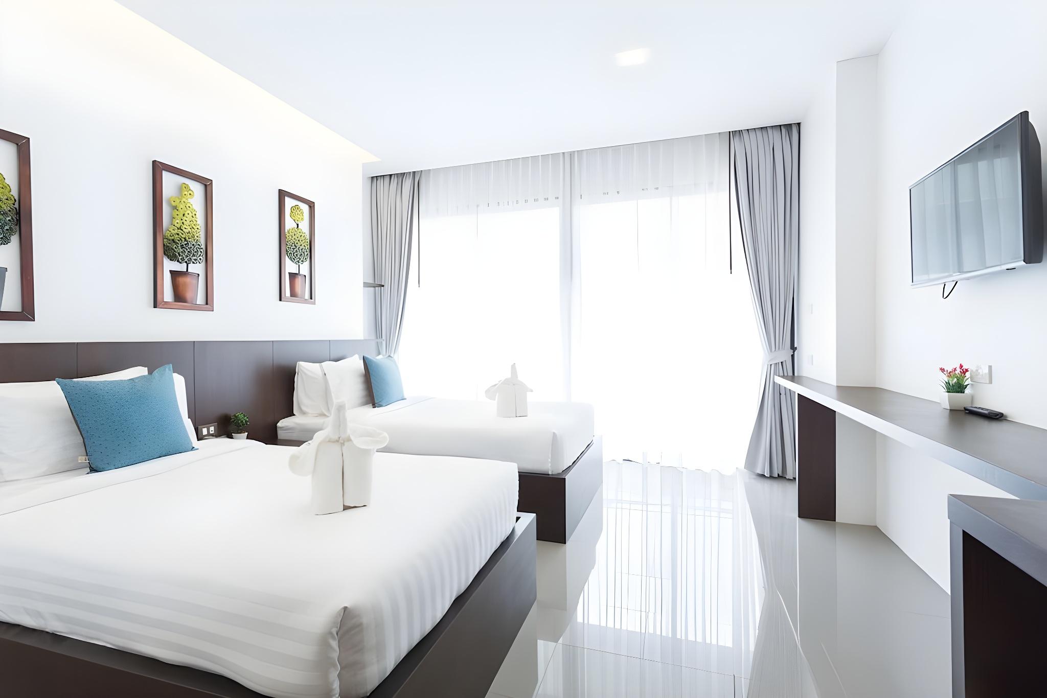 DELUXE, TWIN BEDS